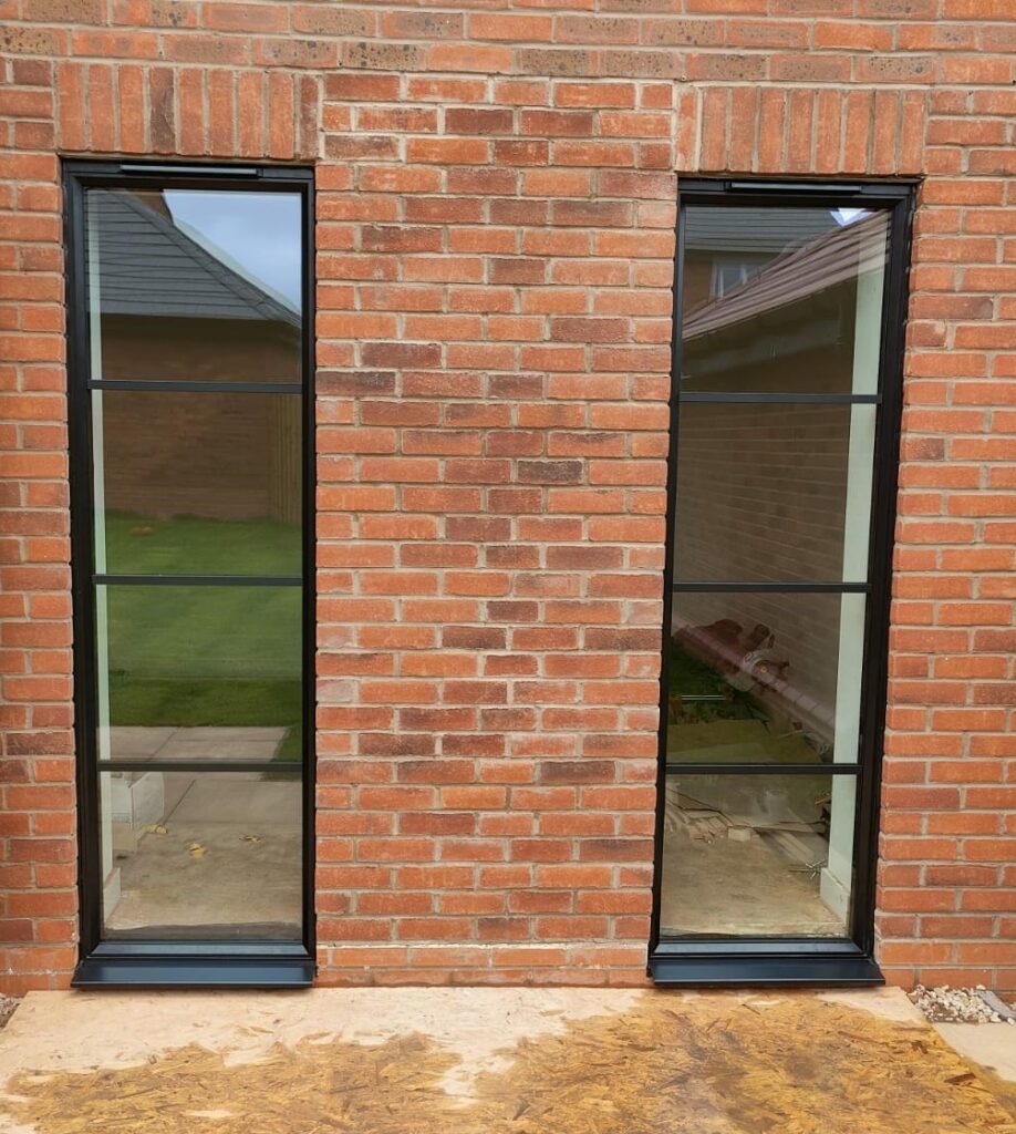 black steel look aluminium windows in a new brick opening