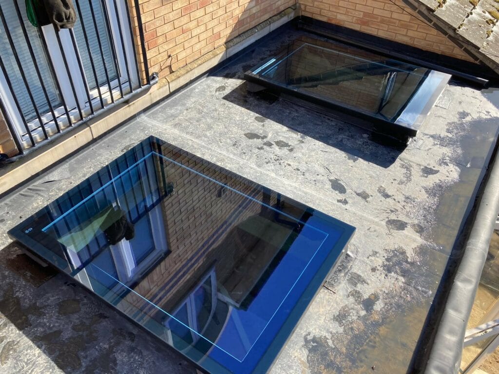 glass aluminium rooflights to a  flat roof extension