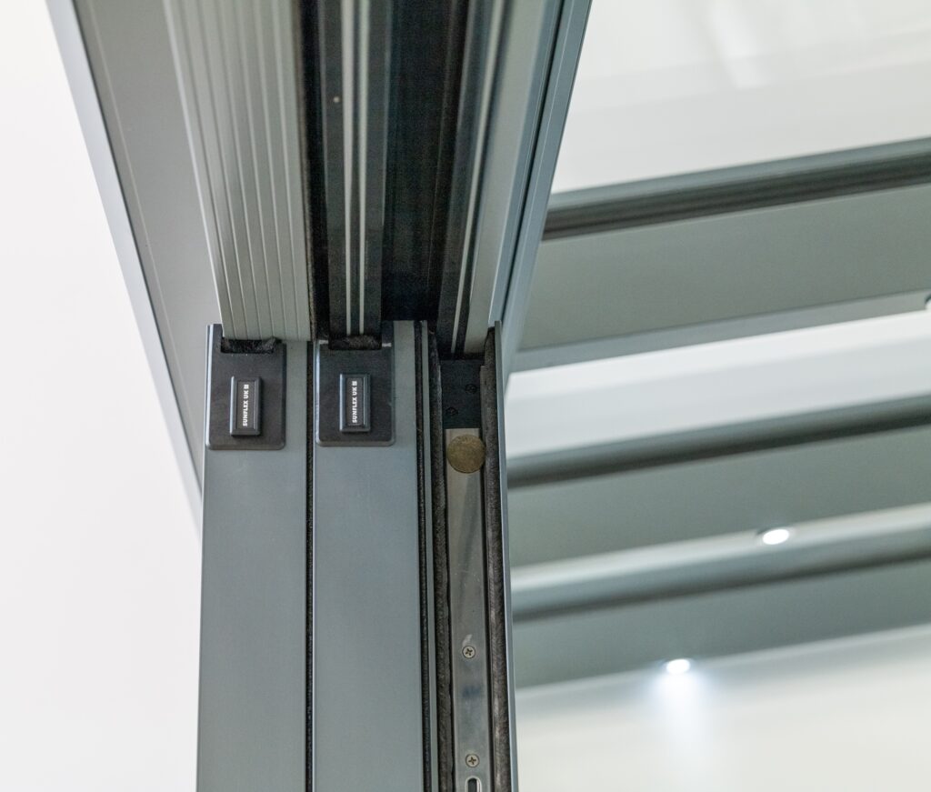 Close up picture of Sunflex sliding doors flush stacking